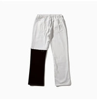 WOVENAURA YIN AND YANG SLIT DENIM PANTS